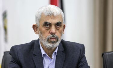 Hamas' Gaza chief Yahya Sinwar attends a meeting with members of Palestinian groups in Gaza City