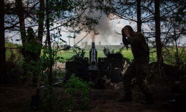 Ukrainian soldiers with the 57th Motorized Brigade operate at an artillery position on June 9