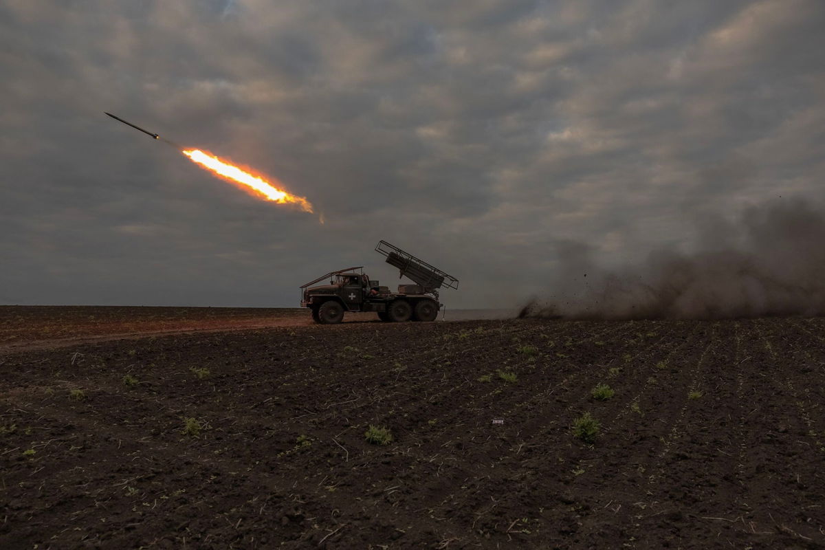 <i>Roman Pilipey/AFP/Getty Images via CNN Newsource</i><br/>Ukrainian servicemen of the 92nd Assault Brigade fire BM-21 'Grad' multiple rocket launcher toward Russian positions