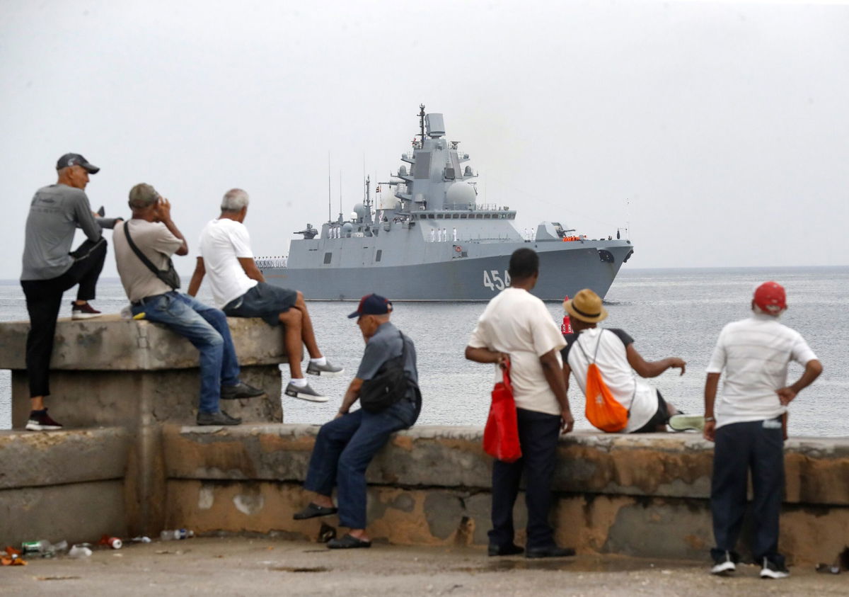 <i>Yander Zamora/Anadolu/Getty Images via CNN Newsource</i><br/>People watch a ship belonging to the Russian Navy flotilla arrive at the port of Havana on Wednesday