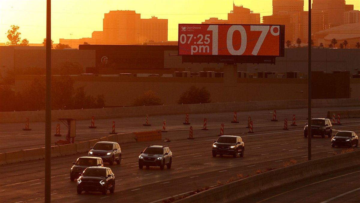 <i>Justin Sullivan/Getty Images via CNN Newsource</i><br/>A billboard shows the current temperature in Phoenix