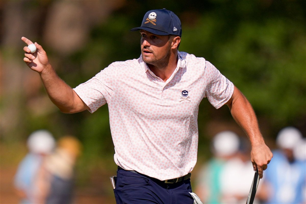 <i>Frank Franklin II/AP via CNN Newsource</i><br/>Bryson DeChambeau waves after making a putt on the fifth hole during the third round of the US Open at Pinehurst Resort in North Carolina.