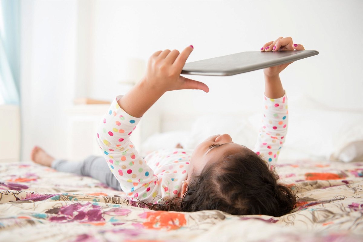 <i>Jamie Grill/Tetra images RF/Getty Images via CNN Newsource</i><br/>New research has found that screen time has little impact on parent-child relationship satisfaction.
