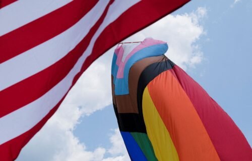 The U.S. and Rainbow flag blows in Franklin