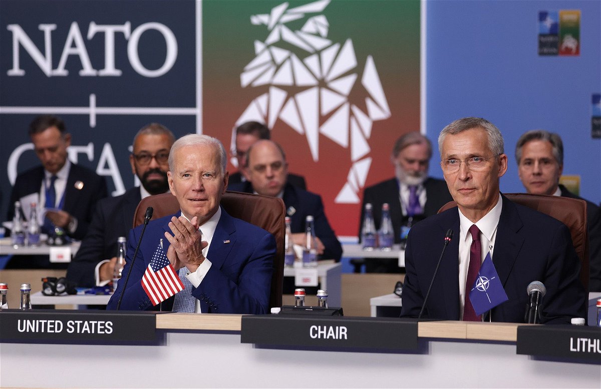 <i>Sean Gallup/Getty Images via CNN Newsource</i><br/>NATO Secretary General Jens Stoltenberg (R) and U.S. President Joe Biden attend the opening high-level session of the 2023 NATO Summit in July 2023 in Vilnius
