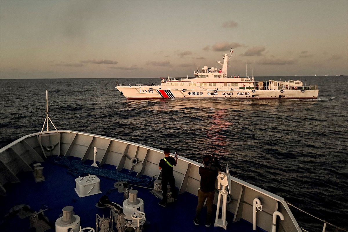 <i>Adrian Portugal/Reuters via CNN Newsource</i><br/>A Chinese Coast Guard vessel blocks a Philippine Coast Guard ship on its way to a resupply mission at Second Thomas Shoal in the South China Sea on March 5.