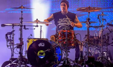 Travis Barker seen here in Brazil in March is celebrating how far he’s come since he was critically injured in a plane crash in 2008.