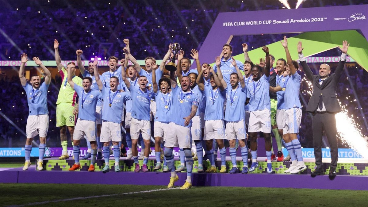 <i>Amr Abdallah Dalsh/Reuters via CNN Newsource</i><br/>Manchester City hoist the Club World Cup trophy in December 2023.