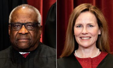 Justices Clarence Thomas and Amy Coney Barrett are both seen here.