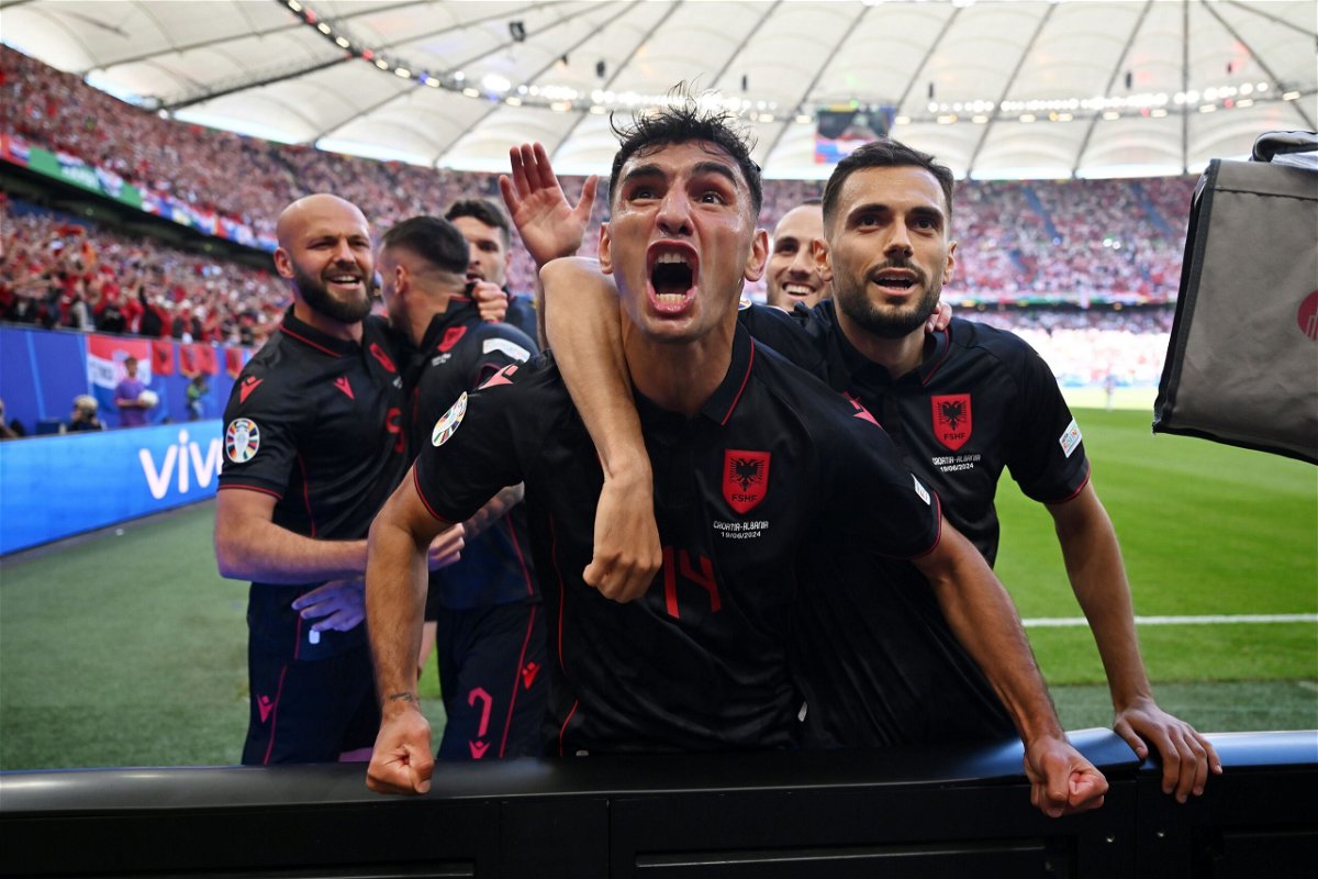<i>Dan Mullan/Getty Images via CNN Newsource</i><br/>Albania players celebrate scoring the first goal of the game.