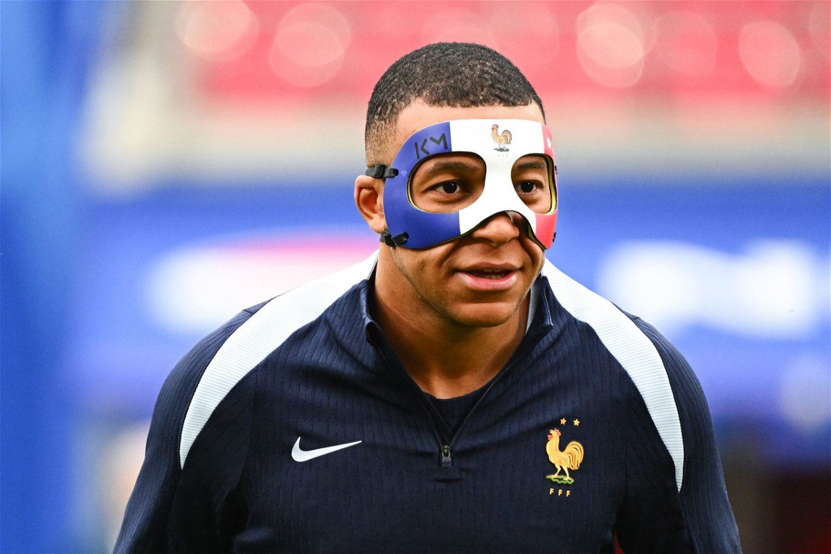 <i>Anthony Dibon/Icon Sport/Getty Images via CNN Newsource</i><br/>Kylian Mbappé wears a mask during France training on June 20.