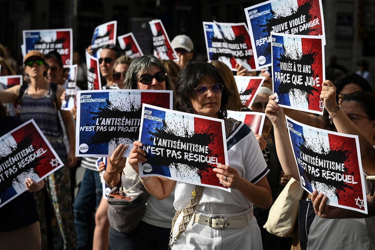 <i>Jean Philippe-Ksiazek/AFP/Getty Images via CNN Newsource</i><br/>Protesters gather to condemn the gang rape of a 12 year-old girl during a rally in Lyon