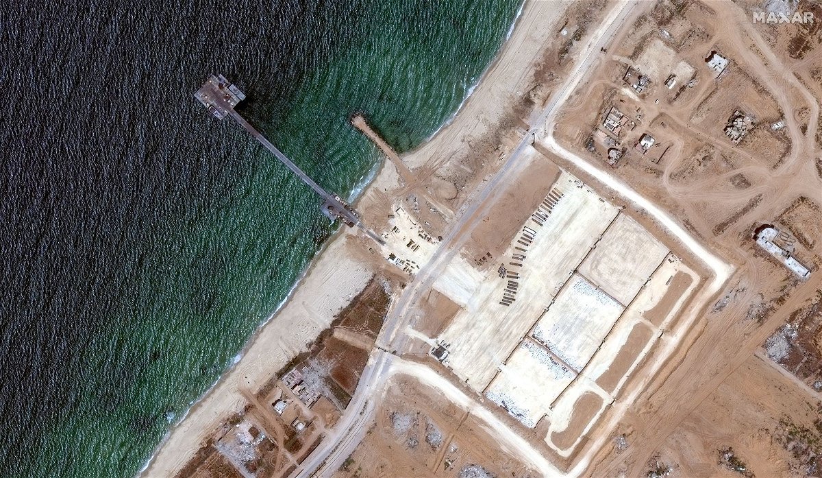 <i>Maxar Technologies/Reuters via CNN Newsource</i><br/>A satellite image shows U.S. military-run humanitarian aid pier in Gaza before its removal