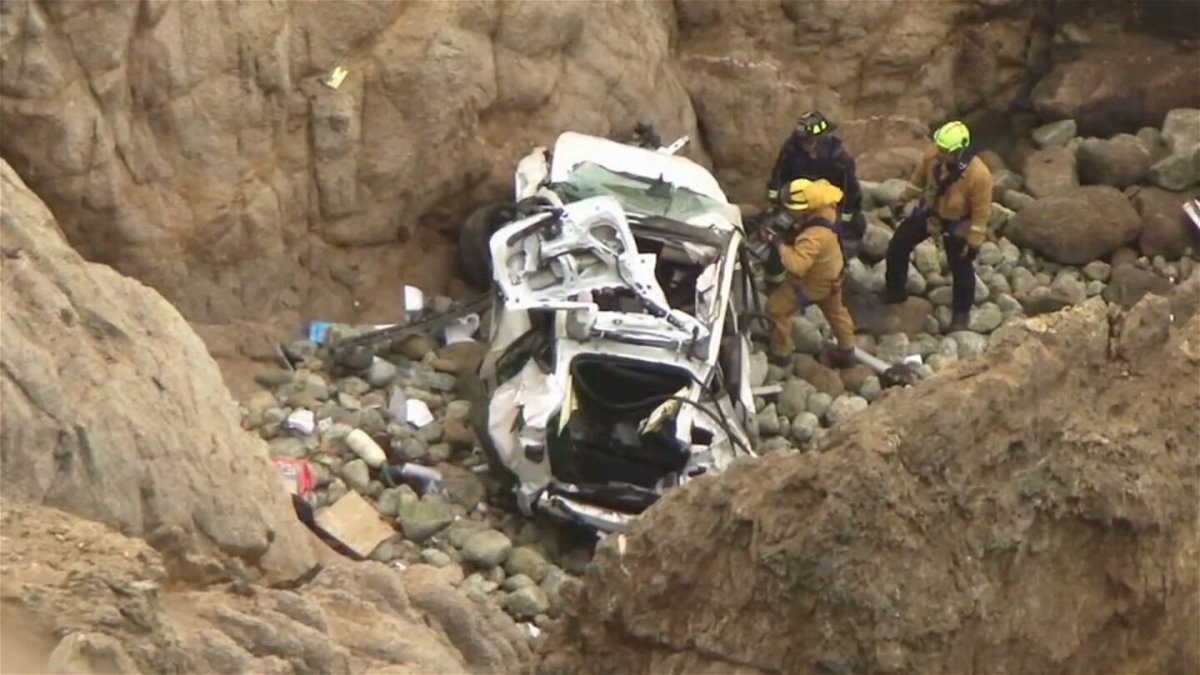 <i>KGO via CNN Newsource</i><br/>This image from the San Mateo County Sheriff's Office shows the Tesla on a rocky beach below the cliffs