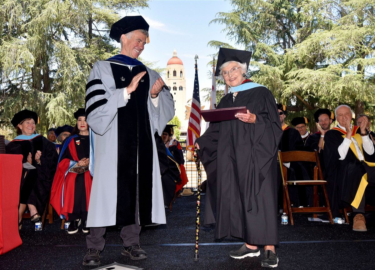 <i>Charles Russo for Stanford University via CNN Newsource</i><br/>Virginia Hislop accepts her diploma for her master of arts in education at Stanford University's 2024 Graduate School of Education commencement ceremony from Dean Dan Schwartz.