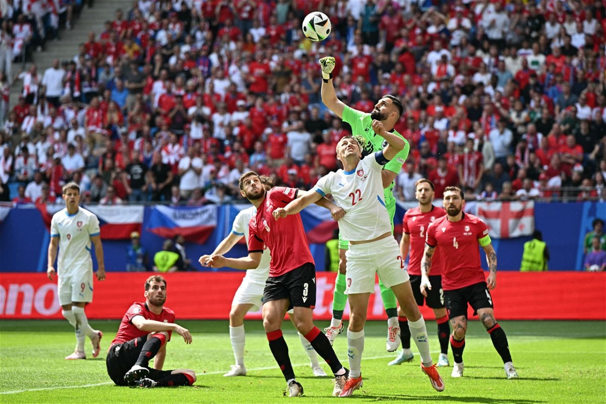 <i>Gabriel Bouys/AFP/Getty Images via CNN Newsource</i><br/>Georgia's goalkeeper Giorgi Mamardashvili punches the ball against Czech Republic in the two team's Group F game at Euro 2024.