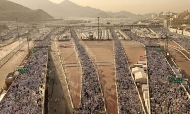 Muslim pilgrims arrive to perform the symbolic 'stoning of the devil' ritual as part of the hajj pilgrimage in Mina