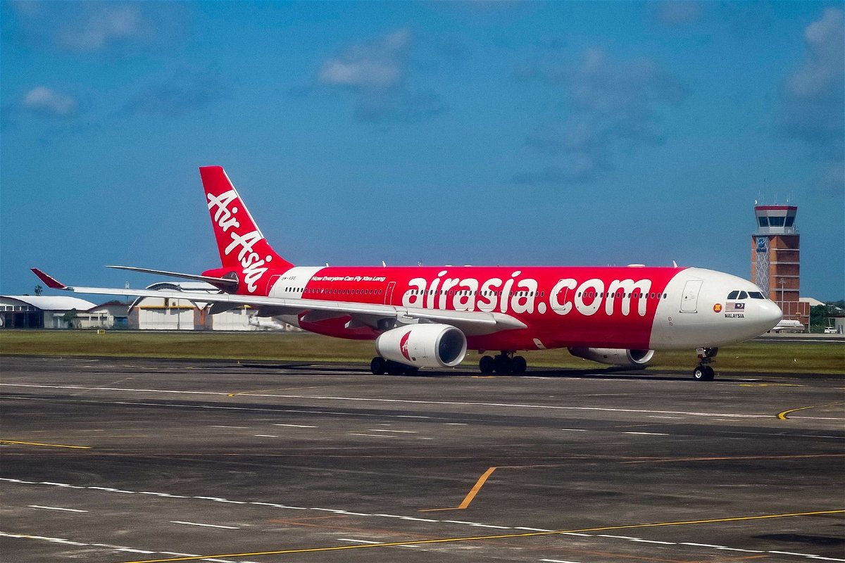 <i>Bay Ismoyo/AFP/Getty Images via CNN Newsource</i><br/>An Airasia passenger plane prepares for take-off at the I Gusti Ngurah Rai International Airport in Denpasar on Indonesia's resort island of Bali in May 2023.