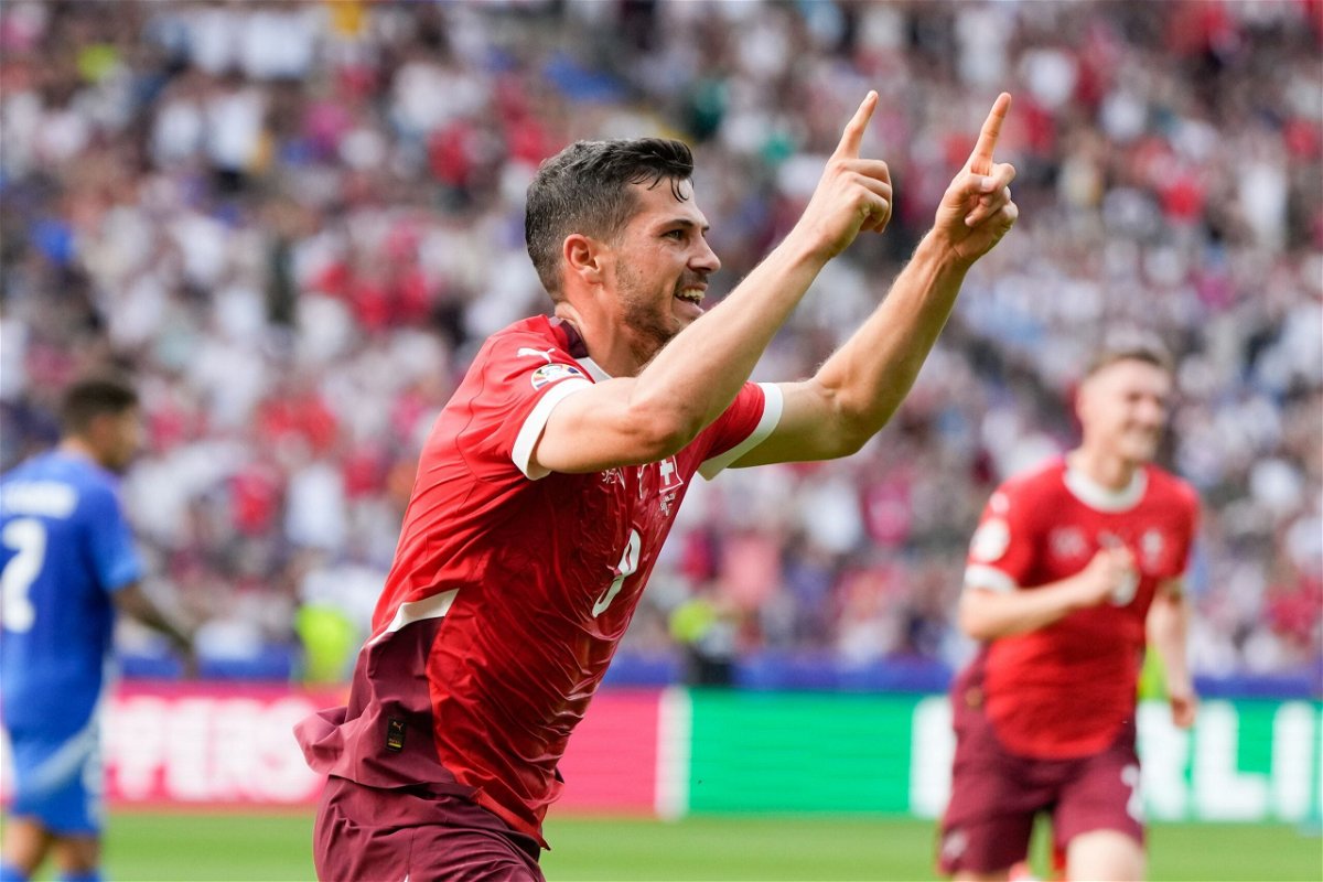 <i>Matthias Schrader/AP via CNN Newsource</i><br/>Switzerland's Remo Freuler celebrates after scoring the first goal of the round of 16.