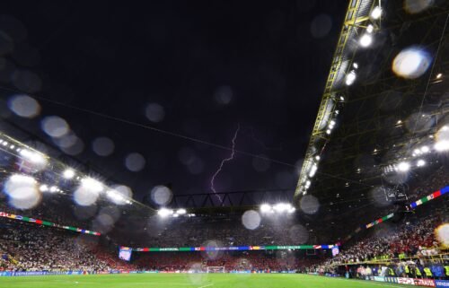 Lightning is seen above BVB Stadion during the Euro 2024 game between Germany and Denmark.
