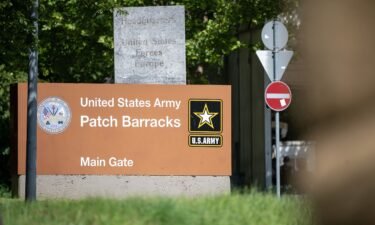 A sign indicates the entrance to the Patch Barracks of the United States Army and the headquarters of the US forces in Europe.