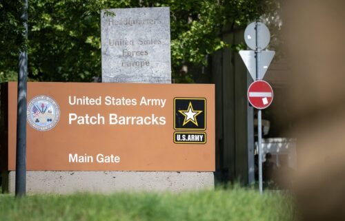 A sign indicates the entrance to the Patch Barracks of the United States Army and the headquarters of the US forces in Europe.