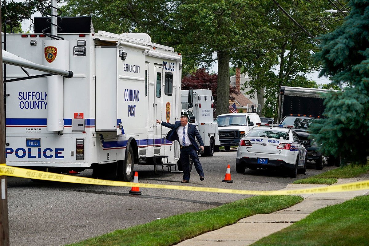 <i>John Minchillo/AP via CNN Newsource</i><br/>Authorities search Heuermann's home on July 18