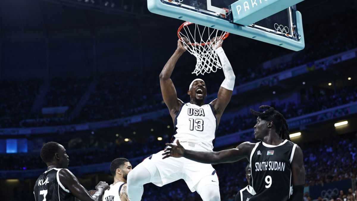 Bam Adebayo reacts after a dunk