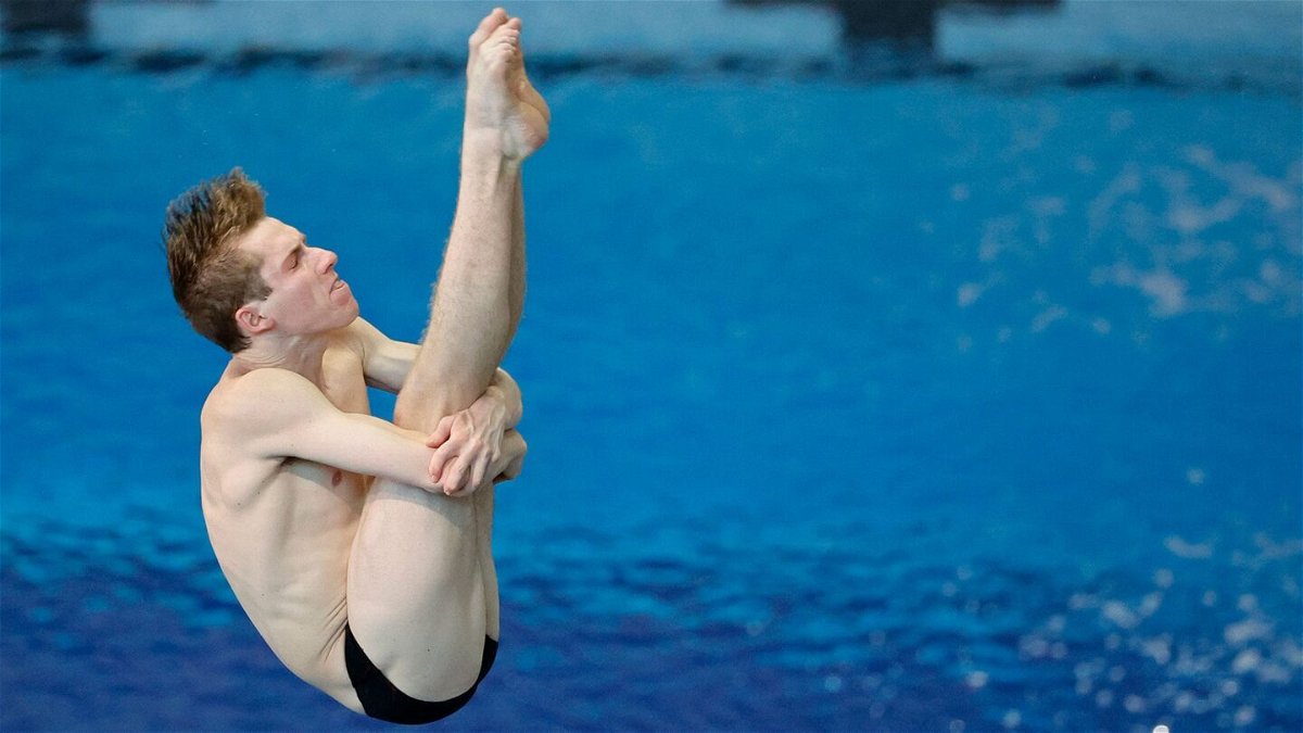 Carson Tyler dives at the 2024 U.S. Olympic Diving Trials at the Allan Jones Aquatic Center in Knoxville