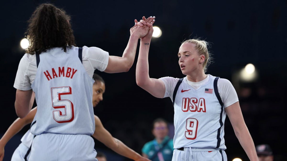 Dearica Hamby and Hailey Van Lith high-five during women's 3x3 game