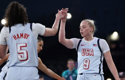 Dearica Hamby and Hailey Van Lith high-five during women's 3x3 game