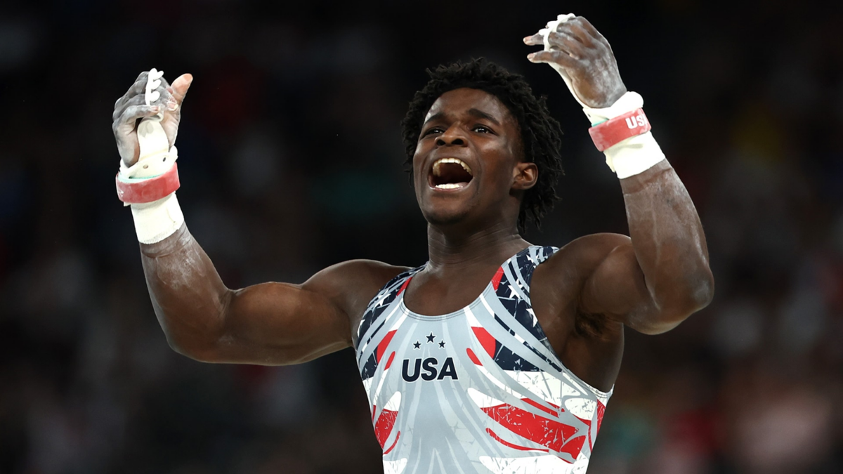 Frederick Richard of the United States celebrates after his high bar routine during the men's team final at the 2024 Paris Olympic Games.