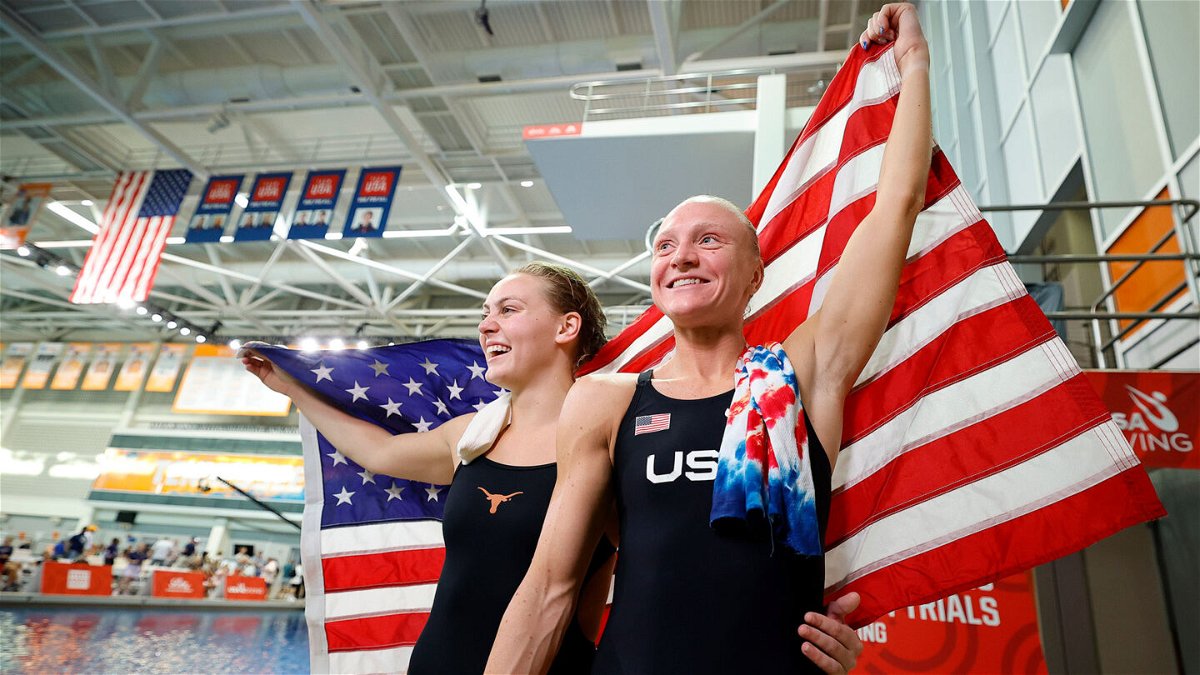 Alison Gibson and Sarah Bacon celebrate after the women's 3m springboard finals during the U.S. Olympic Diving Trials.
