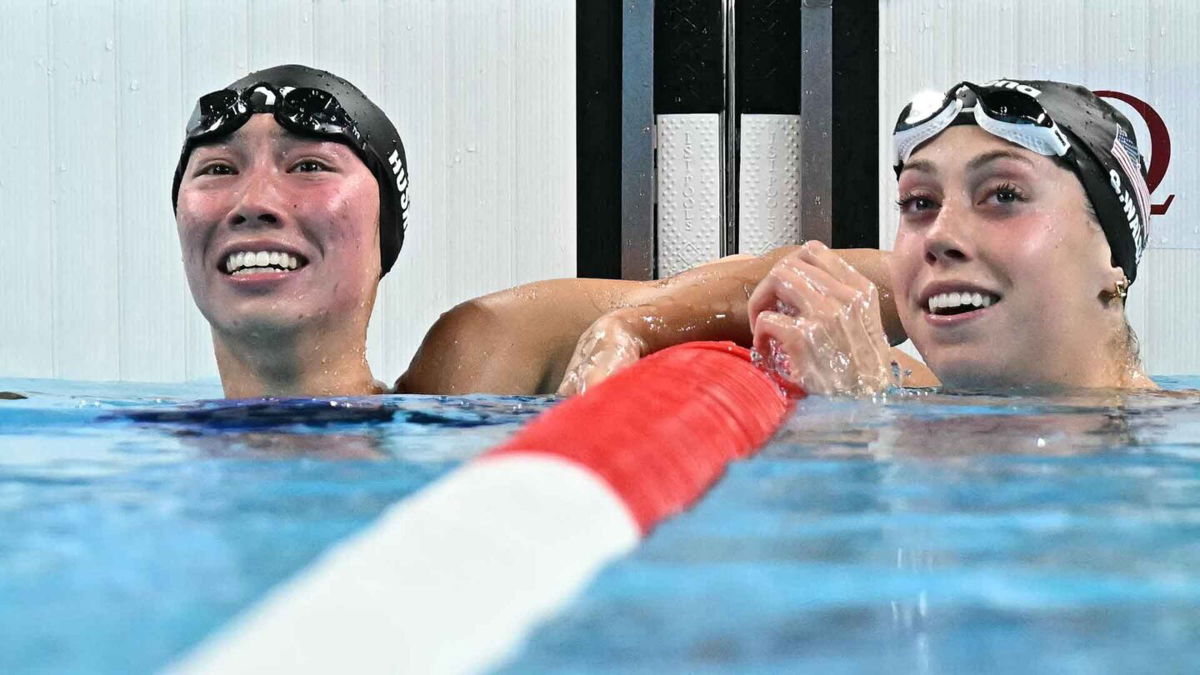 Torri Huske (left) and Gretchen Walsh celebrate a 1-2 finish for the United States in the women's 100m butterfly.