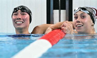 Torri Huske (left) and Gretchen Walsh celebrate a 1-2 finish for the United States in the women's 100m butterfly.