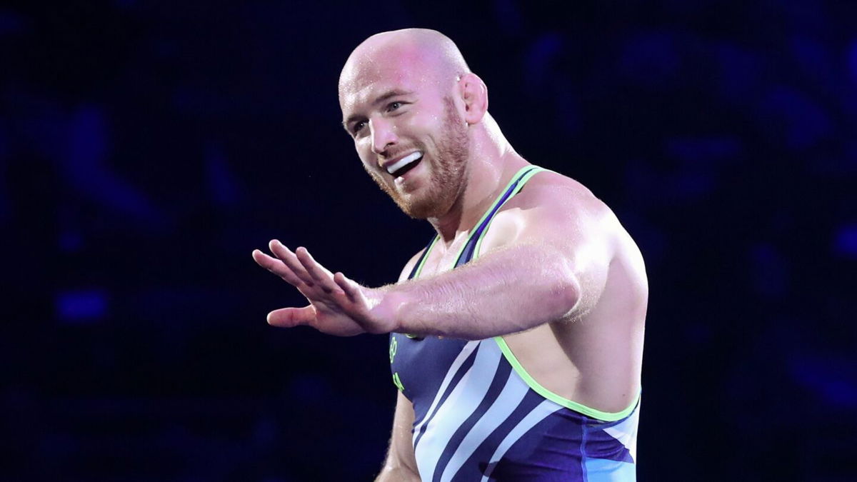 U.S. wrestler Kyle Snyder waves to his family