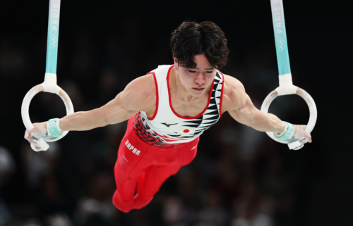 Shinnosuke Oka of Japan competes on the rings during the all-around final at the 2024 Paris Olympics.
