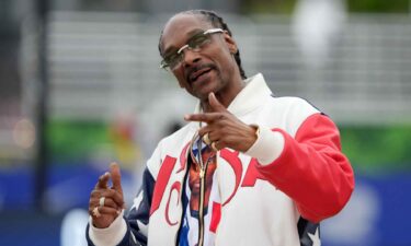 Snoop Dogg poses for a photo