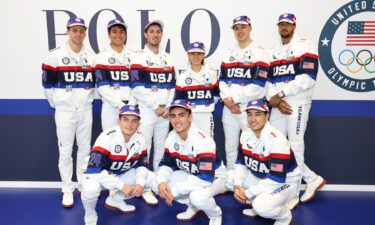 Team USA foil and sabre fencers pose for a photo