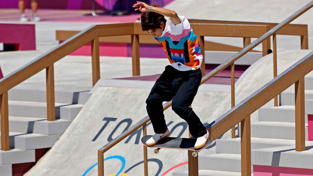 Yuto Horigome slides down a rail on his skateboard