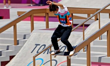 Yuto Horigome slides down a rail on his skateboard