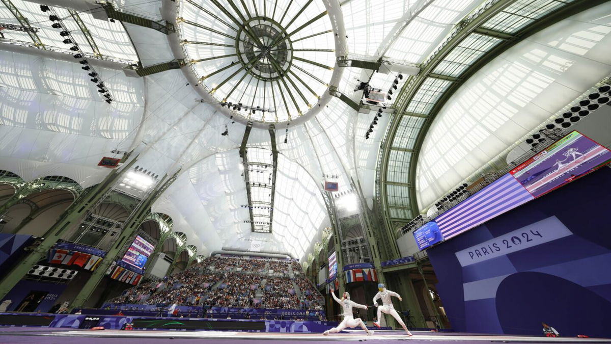 Misaki Emura of Japan defeats Olena Kravatska of Ukraine in a women's sabre table of 32 bout during the 2024 Paris Olympics at Grand Palais.