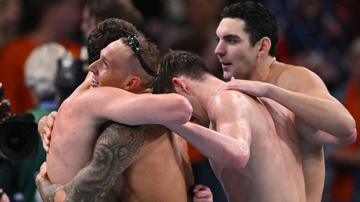 The United States men's 4x100m freestyle relay team celebrates winning gold at the 2024 Paris Olympics.