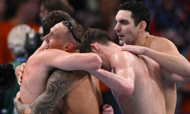 The United States men's 4x100m freestyle relay team celebrates winning gold at the 2024 Paris Olympics.