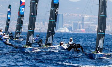 Sailors compete in windsurfing