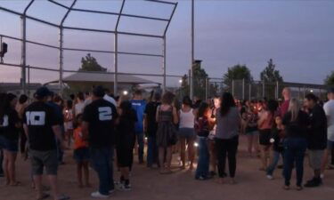 A deep sense of loss coursed through a Menifee community as many stood by candlelight and remembered three young softball players and their mother killed while returning from vacation.