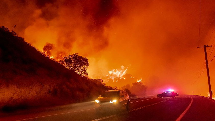 Cars escape the Bond Fire as it crosses near Silverado Canyon in Orange County, California, on December 3, 2020. It's always important when you're in fire-prone areas to know escape routes and back-up exits.