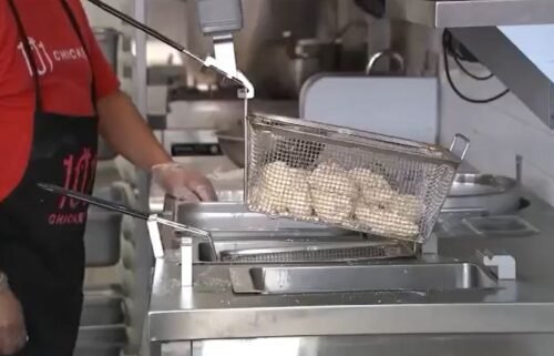 Robot chefs are cooking food at 101 Chicken