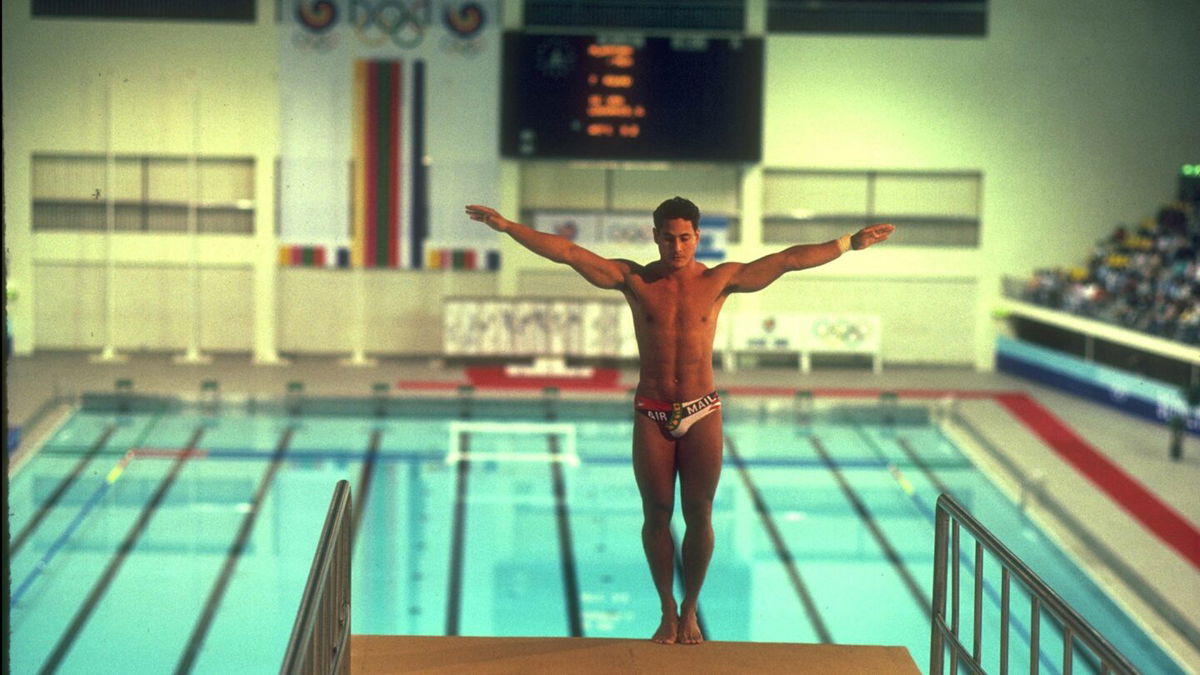 Greg Louganis prepares to dive off the platform at the 1988 Seoul Olympics.