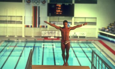 Greg Louganis prepares to dive off the platform at the 1988 Seoul Olympics.